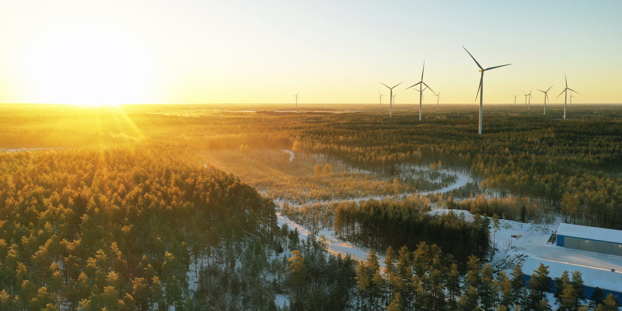 Sunset at a wind turbine area.